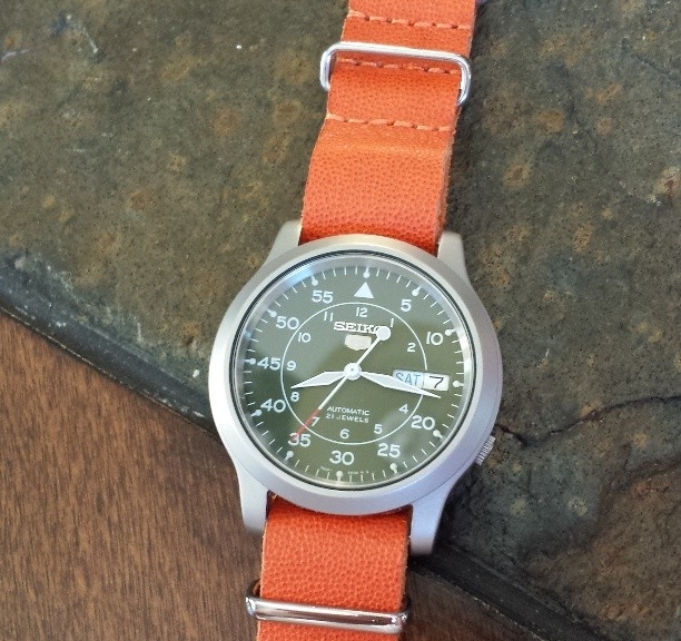 Seiko 5 on a leather NATO strap from #cheapestnatostraps This leather NATO is on sale now for just $10! #seiko #seiko5 #natostrap #natoband