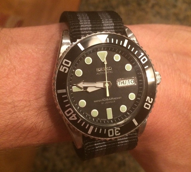 Seiko divers watch on a black and gray James Bond striped Zulu strap from #cheapestnatostraps.com #seikodiver #seiko #diverswatch #zulustrap #jamesbond #natostrap #natoband #klocksnack #watchuseek #watchband #watchstrap